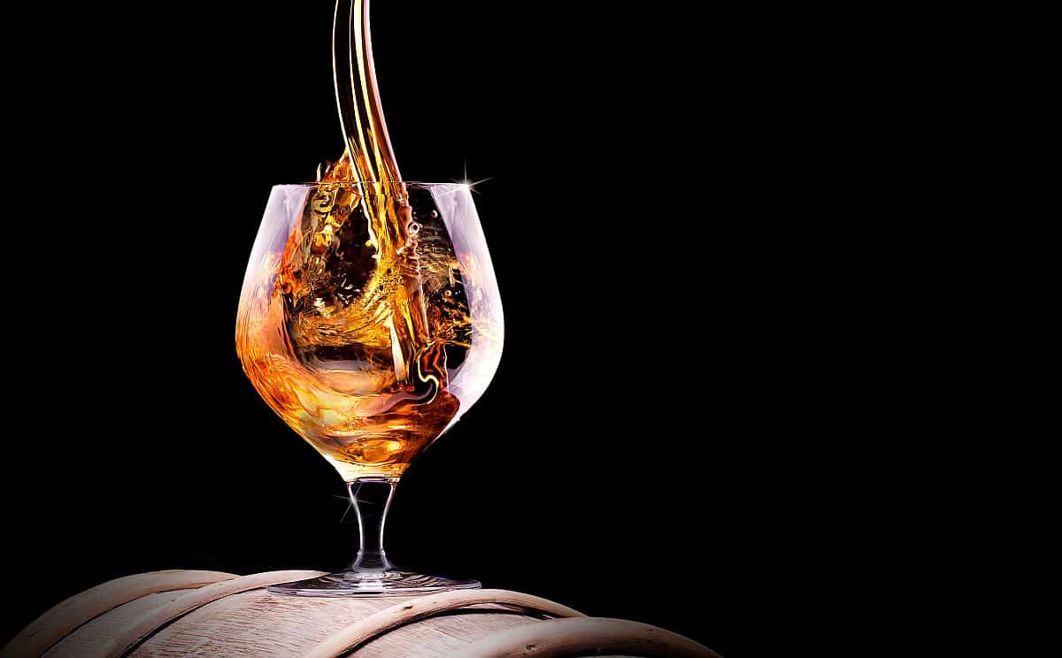 Cognac or brandy on a black
